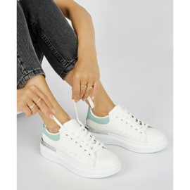 White women's sneakers with a green element 1