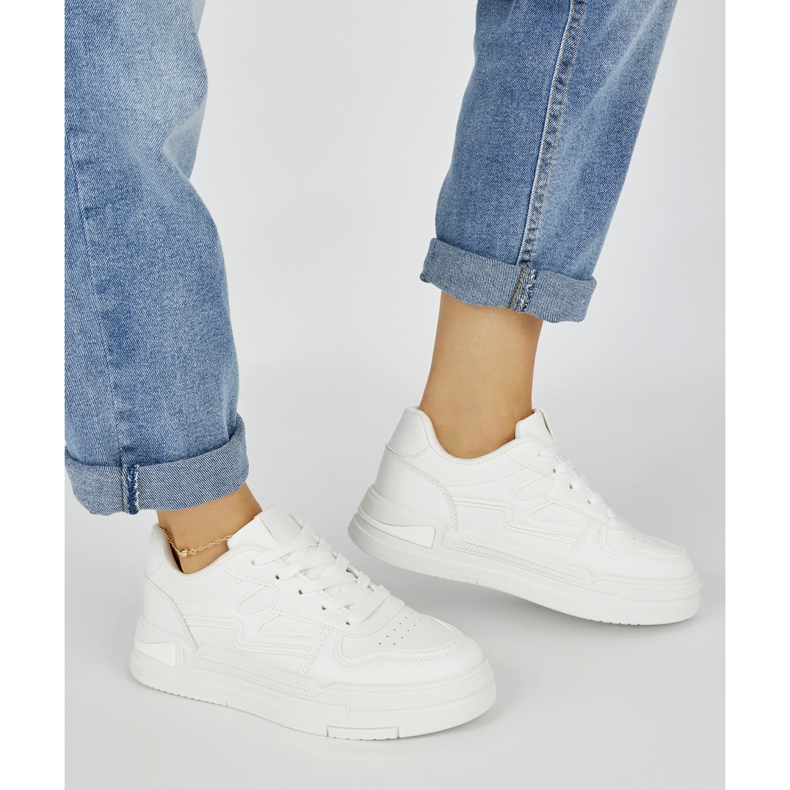 Women's white sneakers on the platform 2