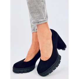 Angela Black high-heeled and platform pumps 1