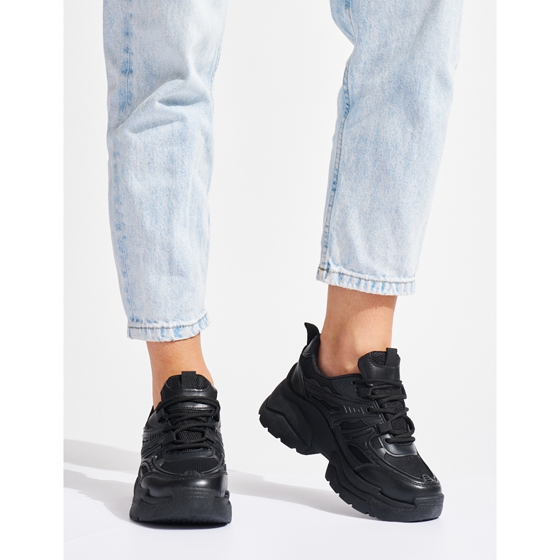 Black sneakers with a thick sole 1