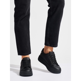 Black women's sneakers on the platform 1