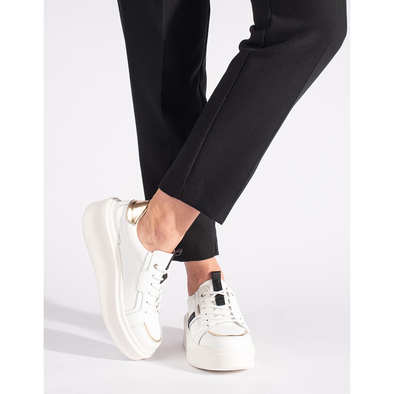 Leather white sneakers on the platform 1