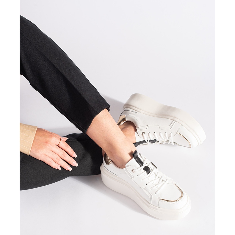 Leather white sneakers on the platform 2