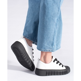 Black and white low sneakers made of genuine leather 2