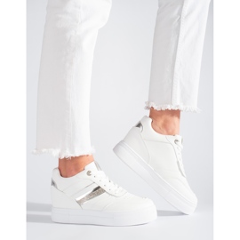 White sneakers with a hidden wedge 1
