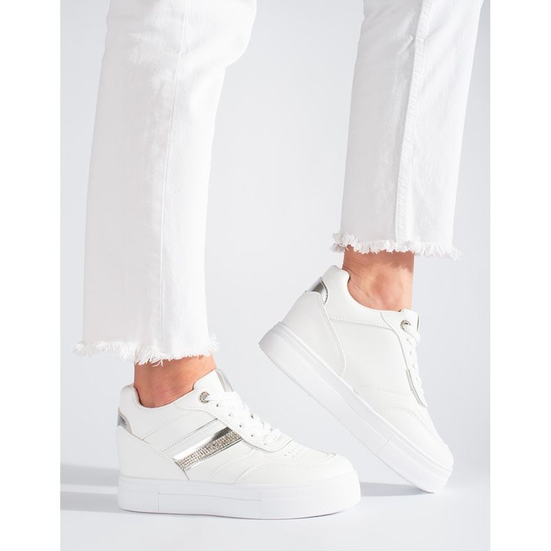 White sneakers with a hidden wedge 1