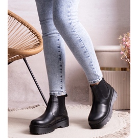 Black platform ankle boots by Lessaya 1