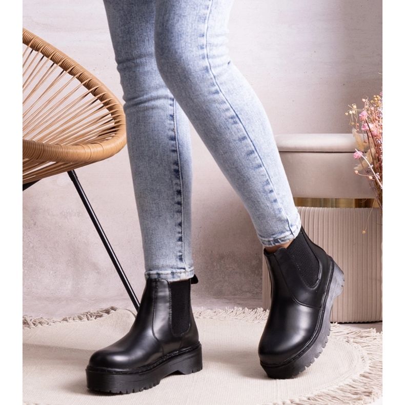 Black platform ankle boots by Lessaya 1