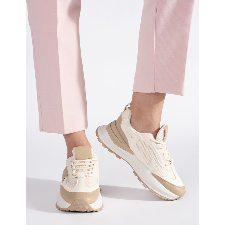 Beige and white women's sports shoes 2