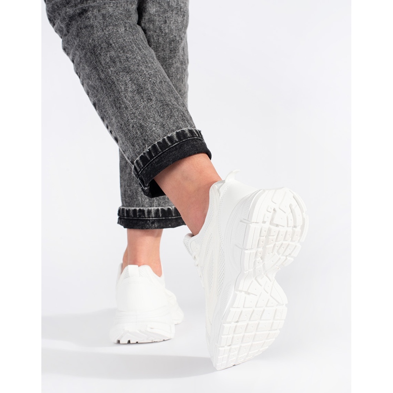 White sneakers with a thick sole 2