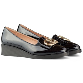 Elegant black patent leather shoes with decoration on a low wedge 1