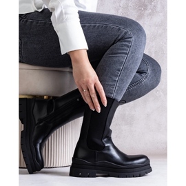 Black ankle boots with a massive Naema sole 1