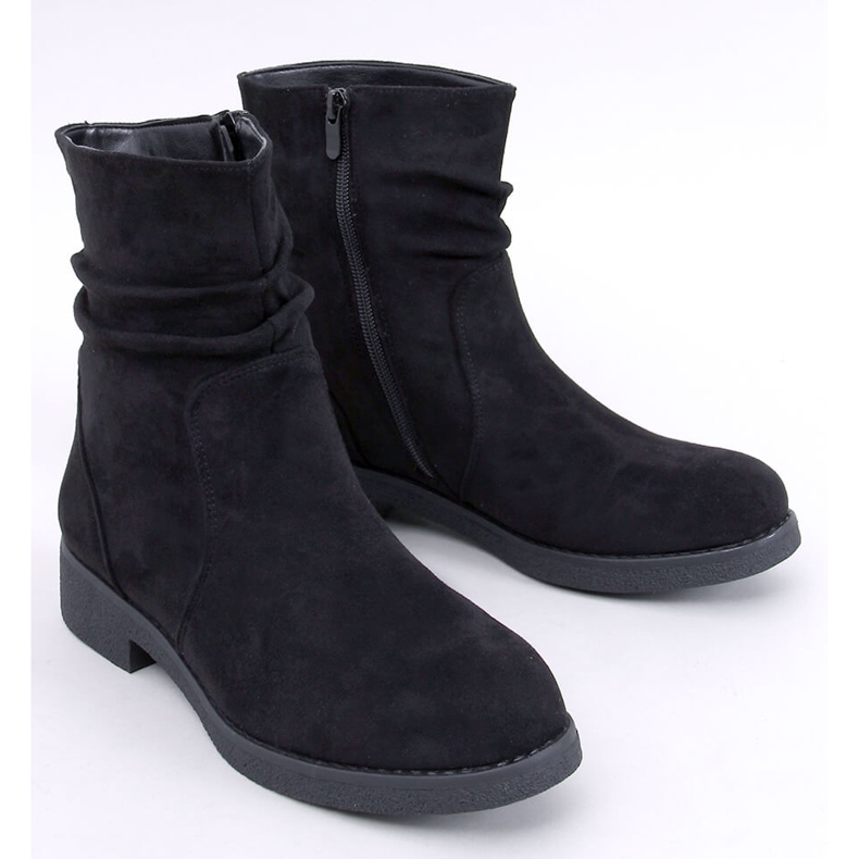 Bracy Black ruffled ankle boots 1
