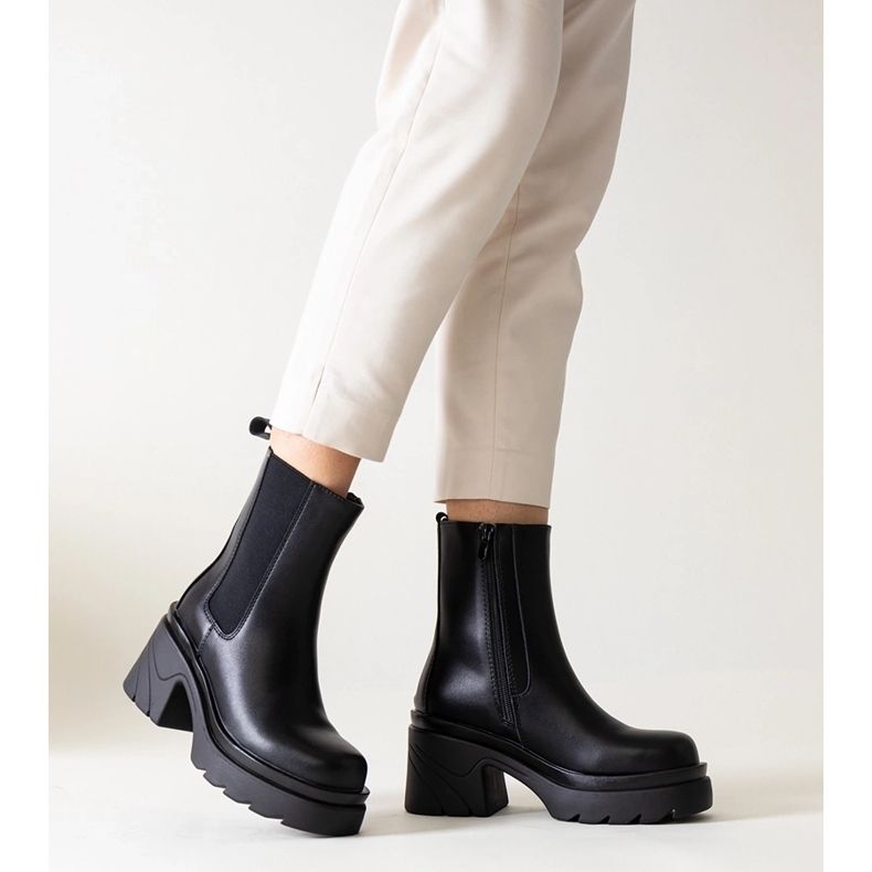 Black ankle boots with a massive Tharney heel 1