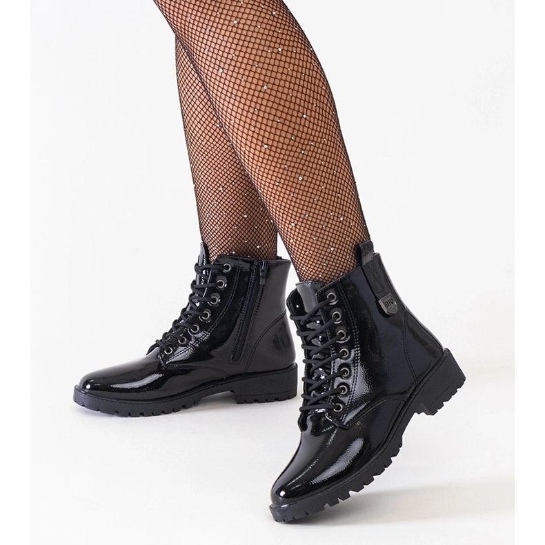 Black patent worker ankle boots on the Madana platform 1