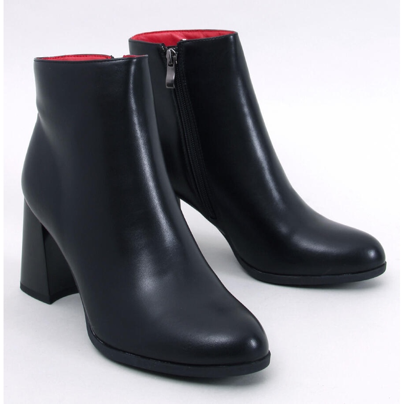 Tanna Black full-grain ankle boots with a stable heel 1