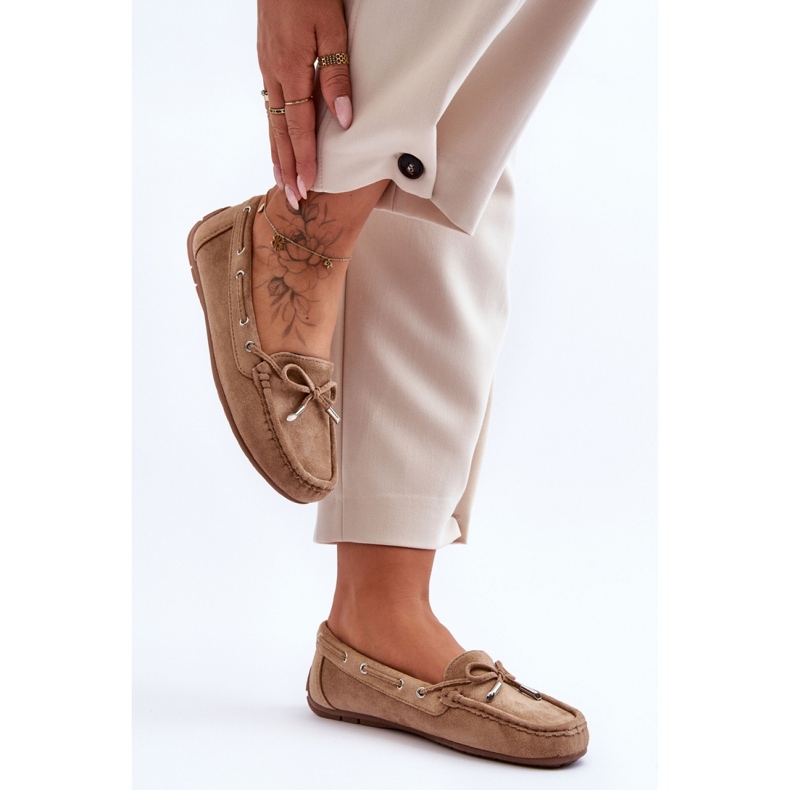 Brown women's moccasins with a bow 2