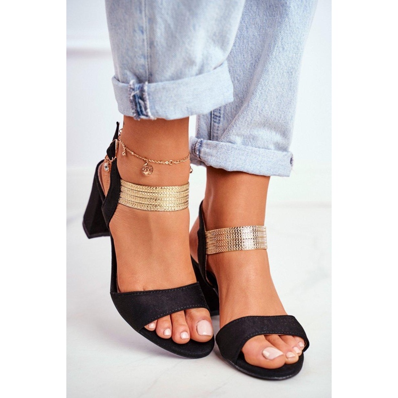 High heel sandals with a decorative Black strap 1