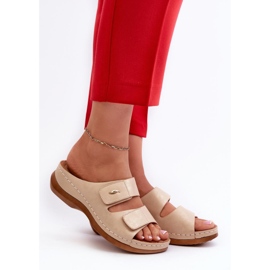 Beige women's flip-flops with a flat sole 1