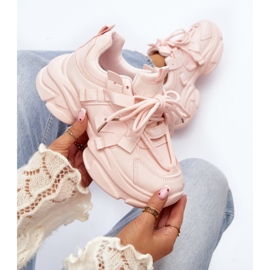 Pink sports shoes with a massive sole 2