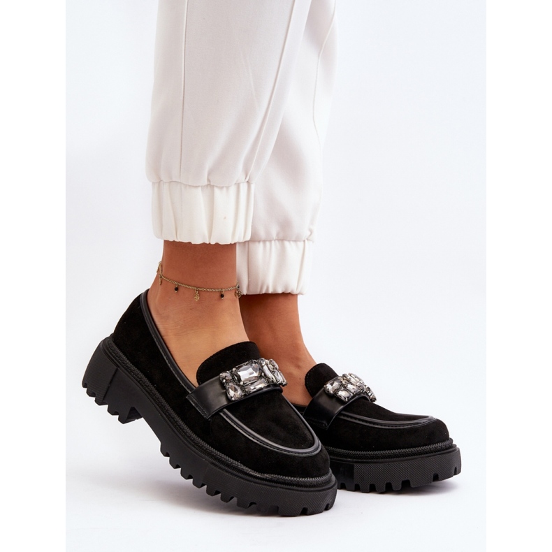 Women's moccasins with a decorative black strap 1
