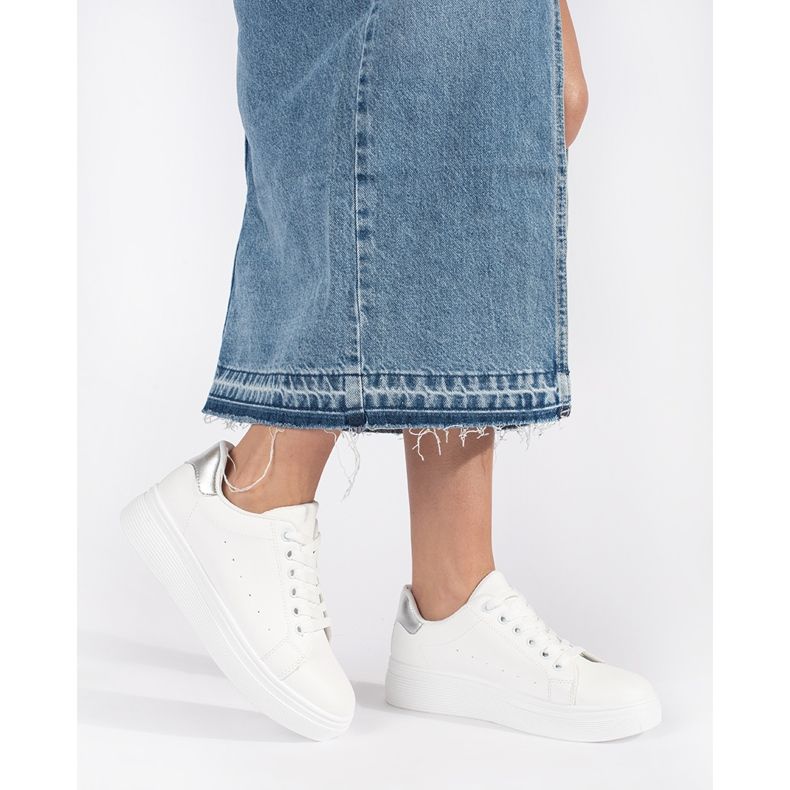 White sneakers on the platform 1