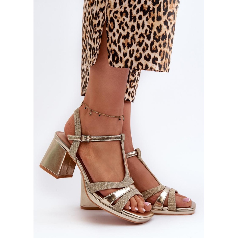 Gold sandals on the post golden 1