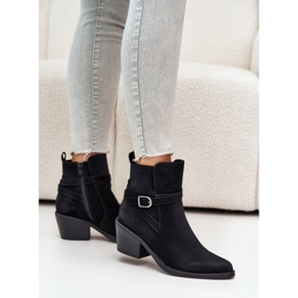 Black high-heeled cowboy boots 1
