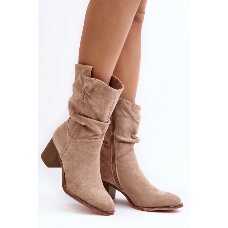 Beige women's ankle boots with a ruffled upper 1