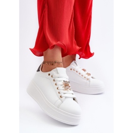 Sports Shoes With a White Pin 1