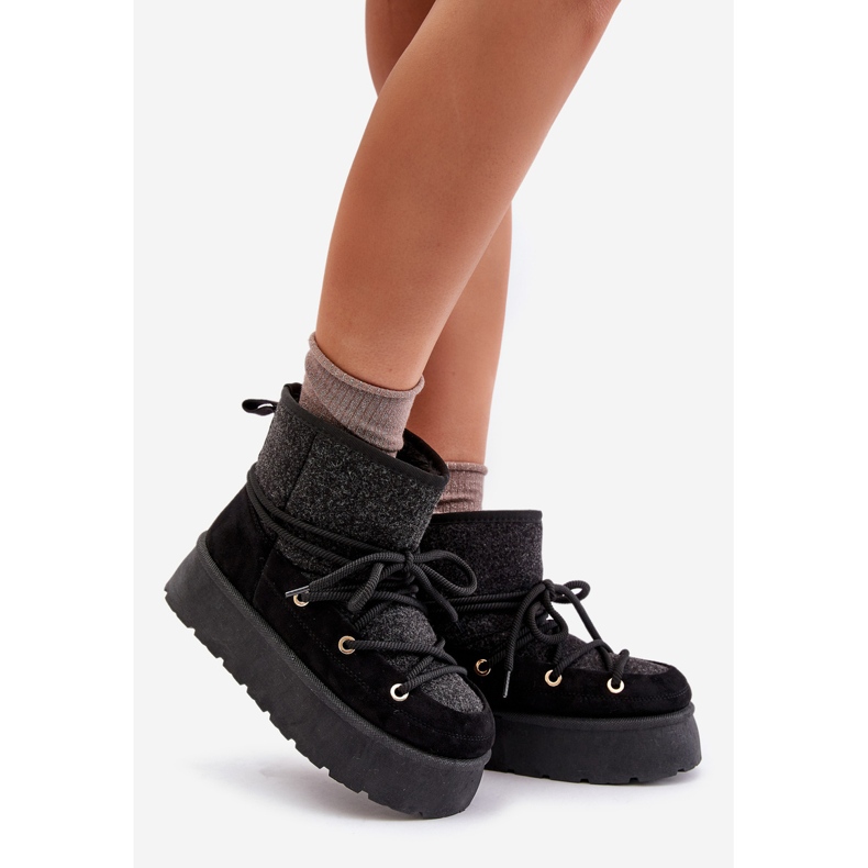 Black Mavora Snow Boots With Lacing On A Platform 1