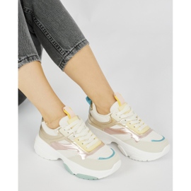 Women's sports shoes with a thick sole golden 1