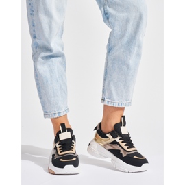 Black and gold sneakers with a thick sole 1