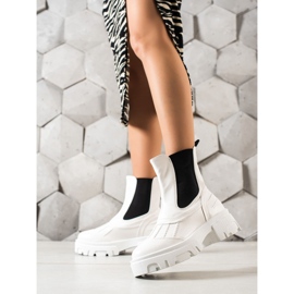 Seastar White slip-on boots black 1