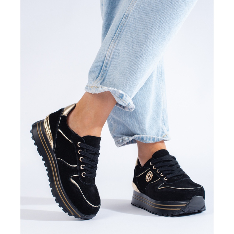 Women's black sneakers on the platform 1