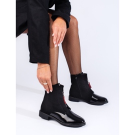 Classic black ankle boots with flat heels 1