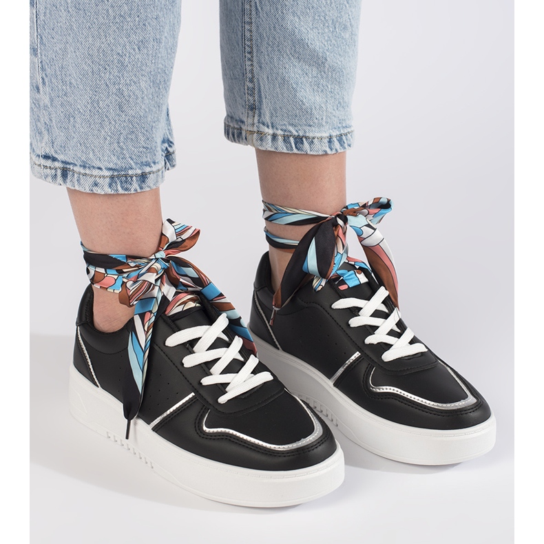 Black women's sneakers tied with a ribbon 1 Black women's sneakers tied with a ribbon 1