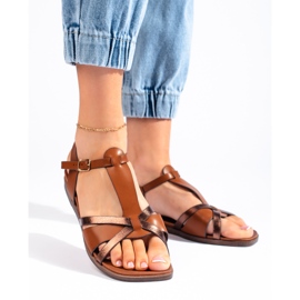 Brown flat sandals by Sergio Leone 1