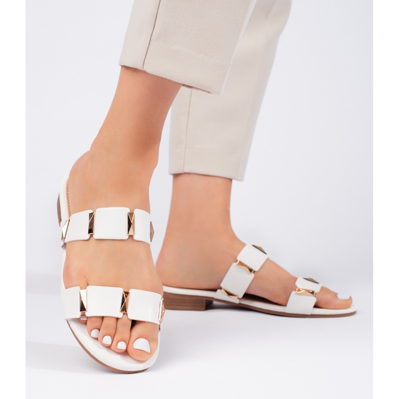 White women's flip-flops with a flat sole 1