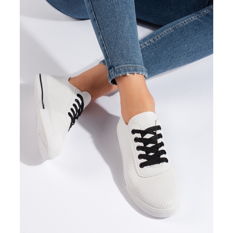 White women's sneakers with black laces 1