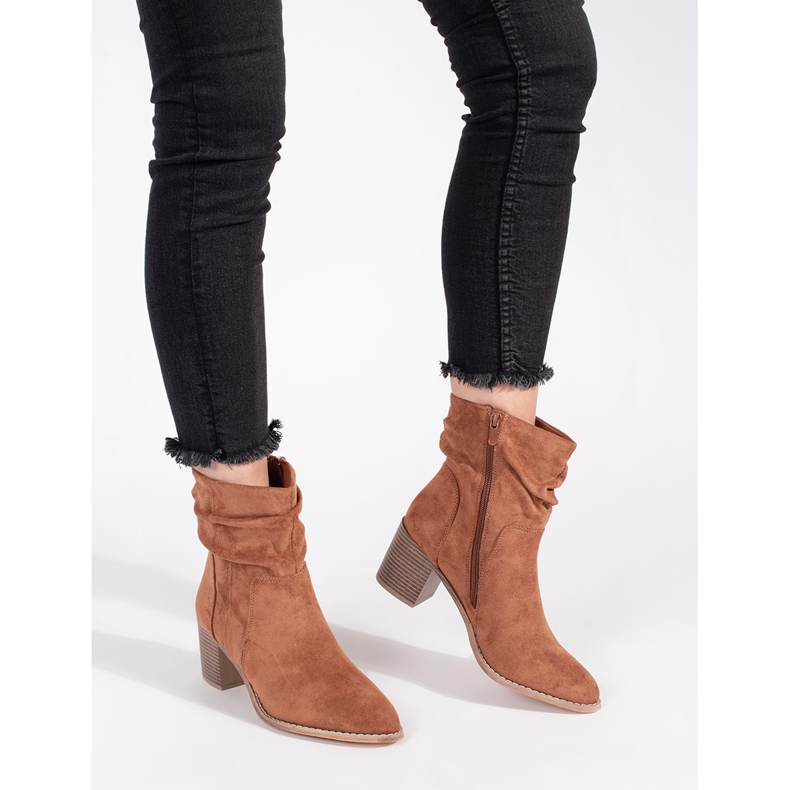 Brown suede ankle boots with a ruffled upper 2