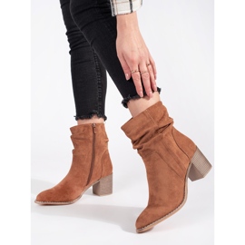 Brown suede ankle boots with a ruffled upper 1