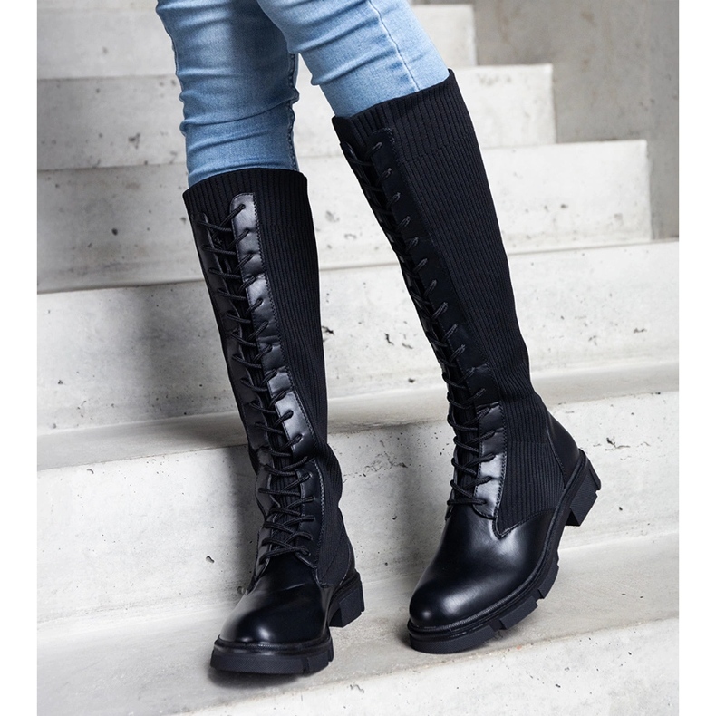 Black slip-on boots with a flexible upper from Veradi 1