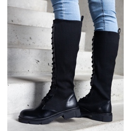 Black slip-on boots with a flexible upper from Veradi 2