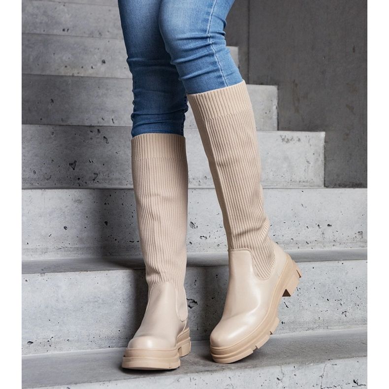 Beige slip-on boots with a flexible upper on a massive Elthea sole 1