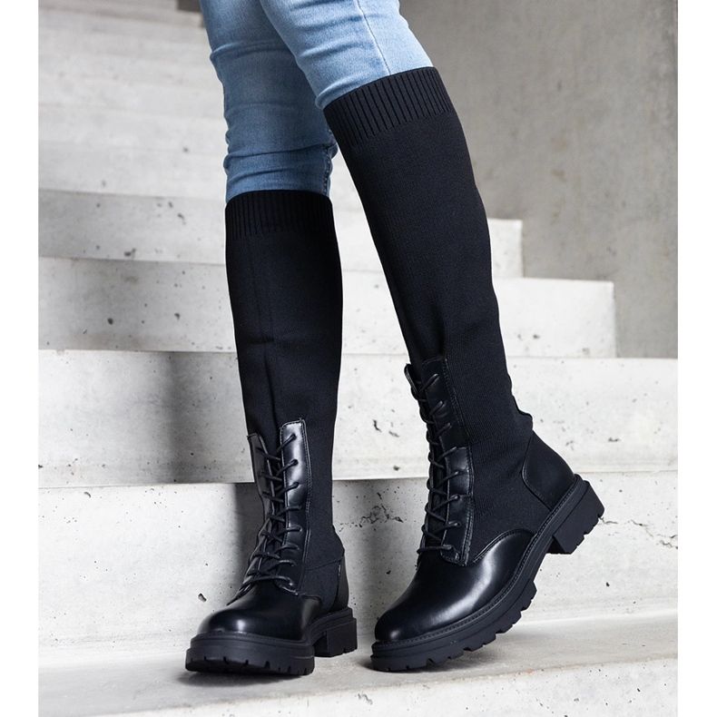 Black slip-on boots with a flexible material upper by Luana 1