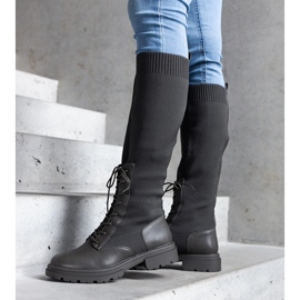 Green slip-on boots with a flexible material upper by Luana 2