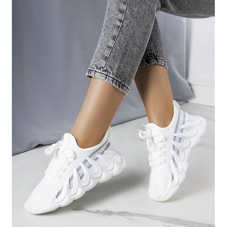 White sneakers on a fashionable Beth sole 2