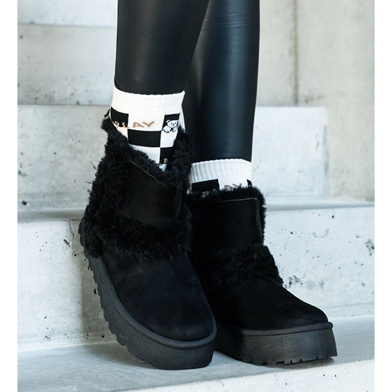 Black eco-suede platform snow boots decorated with fur from Peters 1