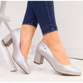 Women's silver pearl pumps on a decorative high heel by Sergio Leone 1